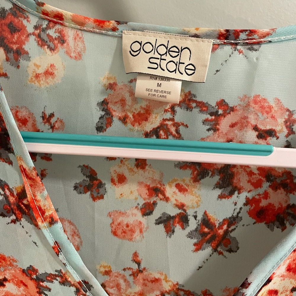 Blue floral print blouse with button detail on sleeve - Picture 4 of 4